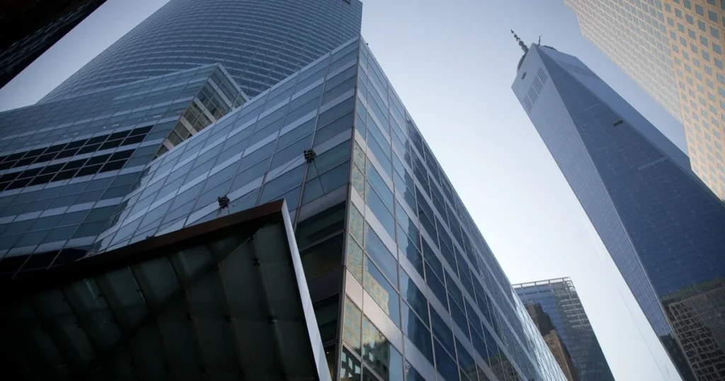 Finance professionals working in accounting firms in India discussing financial reports and audit strategies