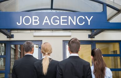 Finance professionals in the USA analyzing reports and preparing for finance job interviews in 2025