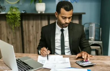 Professional creating a modern resume for finance jobs in Dubai, highlighting skills, experience, and achievements for top UAE employers.