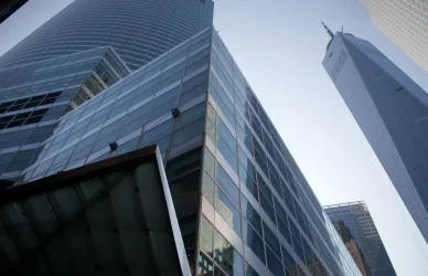 Finance professionals working in accounting firms in India discussing financial reports and audit strategies