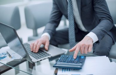 Finance professionals working in fintech startups in Dubai analyzing digital financial data